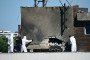 Police and forensic investigators examine the location of impact after a Russian drone struck an apartment building in Galați, eastern Romania. (Source: Getty Images)