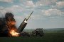 A M142 HIMARS launches a rocket toward Bakhmut on May 18, 2023, in Ukraine’s Donetsk region.