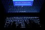 A person types a password on a laptop, as the screen reads “Enter Password.” Illustrative photo. (Source: Getty Images)