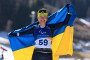 Bronze medalist Oleksandra Kononova of Team Ukraine celebrates in the finish area after competing in the Para Biathlon Individual Standing on day two of the Milano Cortina 2026 Winter Paralympic Games on March 08, 2026. (Source: Getty Images)