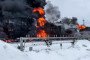 Oil tanks burning after a reported drone attack on a facility in Klintsy, Russia, on February 19, 2025.
