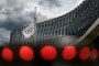 A picture taken on June 8, 2020, shows the Olympic flag flying next to the headquarters of the International Olympic Committee (IOC) in Lausanne. (Source: Getty Images)