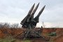 A serviceman of the 208th Kherson Anti-Aircraft Missile Brigade stands on combat duty near a launcher of the MIM-23 Hawk surface-to-air missile system in the Mykolaiv region, Ukraine, on March 30, 2026. (Source: Getty Images)