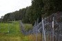 A razor-wire boundary fence is seen along the Polish-Lithuanian border with the Russian exclave of Kaliningrad near the village of Grzybina, Podlaskie Voivodeship, near the Suwalki Gap on September 26, 2026. (Source: Getty Images)