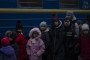 Children, evacuated from an orphanage in Zaporizhzhia, arrive at main train terminal on March 05, 2022 in Lviv, Ukraine. (Source: Getty Images)