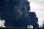 Black smoke rises from the area of the Russian oil producer Gazprom Neft's Moscow oil refinery. (Source: Getty Images)