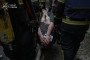 Emergency responders evacuate an injured resident from a building damaged in a Russian drone strike on Kyiv’s Pecherskyi district on September 25, 2026. (Source: SES)