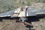 Debris from a Russian drone lies in the grass. (Source: Getty Images)