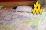 A photograph of a Russian commander’s working map detailing troop distributions for the 247th Guards Air Assault Regiment, overlaid with the yellow logo of the “Atesh” partisan movement. (Source: Atesh)