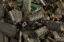 Recycled microchips and electrical components to be used for gold material salvage sit in a container at the JSC Krastsvetmet non-ferrous metals plant in Krasnoyarsk, Russia. (Source: Getty Images)
