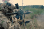 A US Army soldier fires an M4-platform carbine during a field exercise. (Source: US Army)