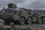 Illustration of Russia’s new armored BAZ tractor with a roof-mounted turret and thermal signature protection. (Source: Russian media)