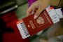 Ticket is seen in a Russian passenger's passport. (Source: Getty Images)