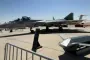 On the right, an S-71K Kover missile next to a Russian fighter jet.