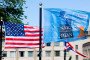 A US and a NATO flag flutter in the wind ahead of a NATO summit in The Hague, on June 23, 2025. (Source: Getty Images)