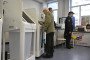 A man votes with an electronic voting system in Russia's parliamentary election at a polling station in Moscow on September 20, 2026.