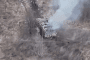 A Russian Typhoon armored vehicle burns after being struck by an FPV drone operated by Ukraine’s Omega Special Purpose Center deep behind Russian lines. (Source: Omega Special Purpose Center)