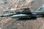 An F-16 Fighting Falcon aircraft fires an AIM-9P4 Sidewinder missile at an MQM-107 target drone. Illustrative photo. (Source: Getty Images)