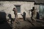 Ukrainian soldiers of the 93rd Brigade with captured Russian troops on the frontline in Donetsk region, Ukraine, March 9, 2026. (Source: Getty Images)