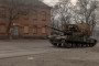 A Ukrainian tank drives on a road in a village in the Dnipropetrovsk region, on March 16, 2025.
