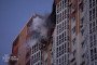 Smoke rises from the upper floors of a residential building damaged in a Russian drone strike on Kyiv. (Source: State Emergency Service)