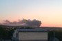 Smoke seen in the area near Mikhailovsk in the Stavropol region, rising from a damaged Russian oil depot, July 9, 2026.