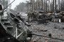 Illustrative image. Ukrainian servicemen walk next to destroyed Russian tanks and armored personnel carriers in Dmytrivka village, west of Kyiv, on April 2, 2022.