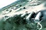 A Ukrainian drone strikes a fuel storage tank at a Russian logistics base in occupied Novoamvrosiivka, Donetsk region. (Source: 1st Azov Corps)