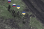 Ukrainian soldiers escort Russians to their positions, May 2026. (Source: 155th Separate Mechanized Brigade)