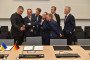 Ukrainian Defense Minister Mykhailo Fedorov (L) shows photos of the aftermath of a Ukrainian drone strike on Moscow to Boris Pistorius (2nd R) and other NATO officials in Brussels on June 18, 2026. (Source: Mykhailo Fedorov)