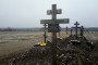 Rows of dug graves marked with Orthodox crosses. Illustrative photo. (Source: Russian media