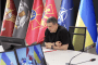 Ukrainian Defense Minister Mykhailo Fedorov speaks with Canadian National Defense Minister David McGuinty during a video call. (Source: MOD/X)