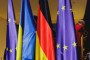 The Ukrainian flag is built up between the German flag and the flag of the European Union in Berlin, Germany. (Source: Getty Images)
