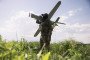 Members of the Unmanned Systems Regiment pose for a photograph with a Bulava strike drone on May 22, 2026, in the Kharkiv region, Ukraine.