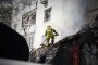 Firefighter at the site of a Russian drone attack on a civilian high-rise in Chernihiv, August 24, 2026.