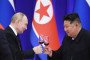 Russian leader Vladimir Putin and North Korean leader Kim Jong Un toast during a reception at the Mongnangwan Reception House in Pyongyang, North Korea. (Source: Getty Images)