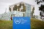 This photograph shows the “the International Criminal Court (ICC)” in the background with its logo on a sign in the foreground in The Hague, on February 23, 2026. (Source: Getty Images)