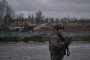 Ukrainian serviceman on the road between Druzhkivka and Kostyantynivka, Donetsk region, amid ongoing Russian artillery and FPV drone threats near the frontline, February 13, 2026. (Source: Getty Images)