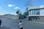 Smoke rises over a World Health Organization humanitarian warehouse in Dnipro, Ukraine. (Source: World Health Organization Ukraine)