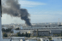 Dark smoke billows over industrial buildings at the Avitek military plant in Kirov after a reported Flamingo cruise missile impact. (Source: OSINT channel Exilenova+)