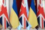 The flags of Great Britain and Ukraine are being displayed before a joint press conference of former UK Prime Minister Rishi Sunak and President of Ukraine Volodymyr Zelensky in Kyiv, Ukraine, on January 12, 2024. (Source: Getty Images)