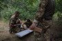 Ukrainian soldiers prepare a Darts attack drone for a strike on Russian artillery positions in the Lyman sector, Donetsk region, August 10, 2026. (Source: Getty Images)