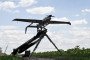 A technician launches a Ukrainian Raybird UAV from a catapult during an aerial reconnaissance mission by soldiers of the 148th Separate Artillery Zhytomyr Brigade in Dnipropetrovsk region, Ukraine, on June 22, 2026. (Source: Getty Images)