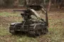 Ukrainian Special Forces Use Robotic Ground Vehicle to Transport Captured Russian Soldier, Video