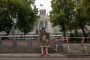Russian artist and activist Semyon Skrepetsky stands outside the Russian Embassy  during a Russia Day action.