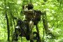 A Ukrainian special forces soldier uses binoculars while standing on a WolfStorm electric bike in a dense forest. The bike’s low noise and thermal signature support covert reconnaissance missions. (Source: UkrSpecConsulting)