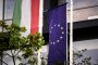The Hungarian, left, and the European Union flags at the EU Point community center in Budapest, Hungary, on April 19, 2023. (Source: Getty Images)