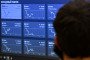 A man looks at a screen displaying stock price movements at the Moscow Exchange office in Moscow on January 10, 2023. Illustrative image. (Source: Getty Images)