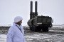 A Russian serviceman stands beside a Bastion coastal defense missile system on Alexandra Land in the Franz Josef Land archipelago, May 2021. (Source: Getty Images)