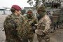 A German Bundeswehr Major speaks to members of the Ukrainian military who are learning to operate Leopard tanks and Marder infantry fighting vehicles during a press date at a training ground. (Source: Getty Images)